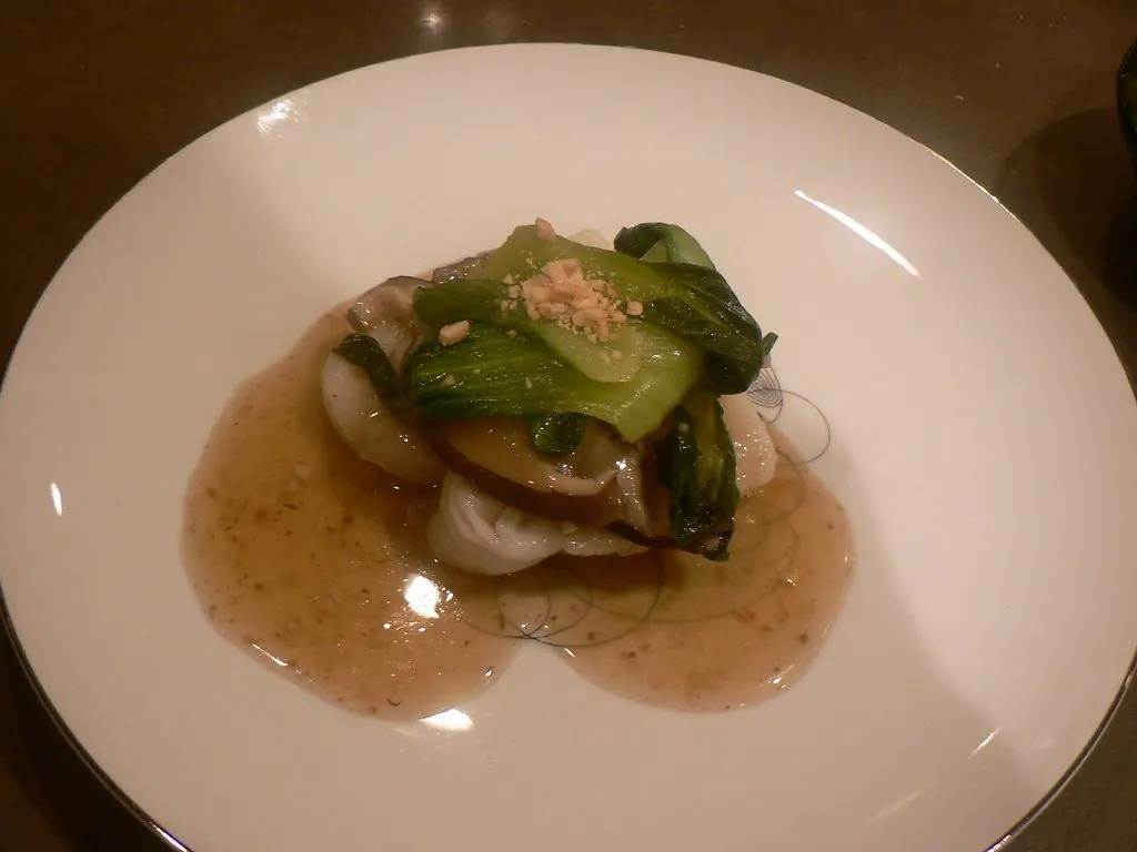 Fresh mushrooms and greens representing seasonal produce